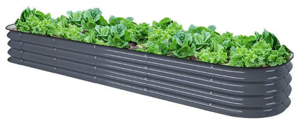 A modular raised garden bed made of dark gray galvanized steel, filled with plants.